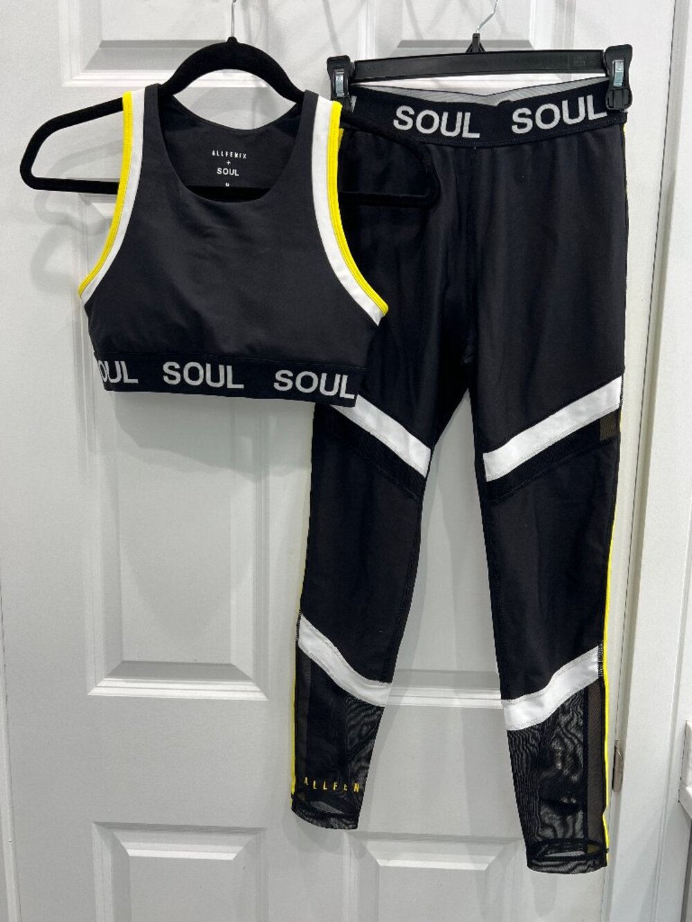 Allfenix/Soul Cycle bra (M) & leggings (S); black w/white & yellow trim